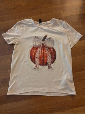 SHEIN Tan Tee with Orange Pumpkin Graphic and Cream Bow